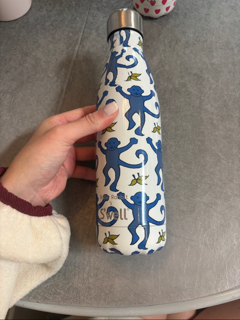 Swell White Bottle with Blue Monkey Pattern